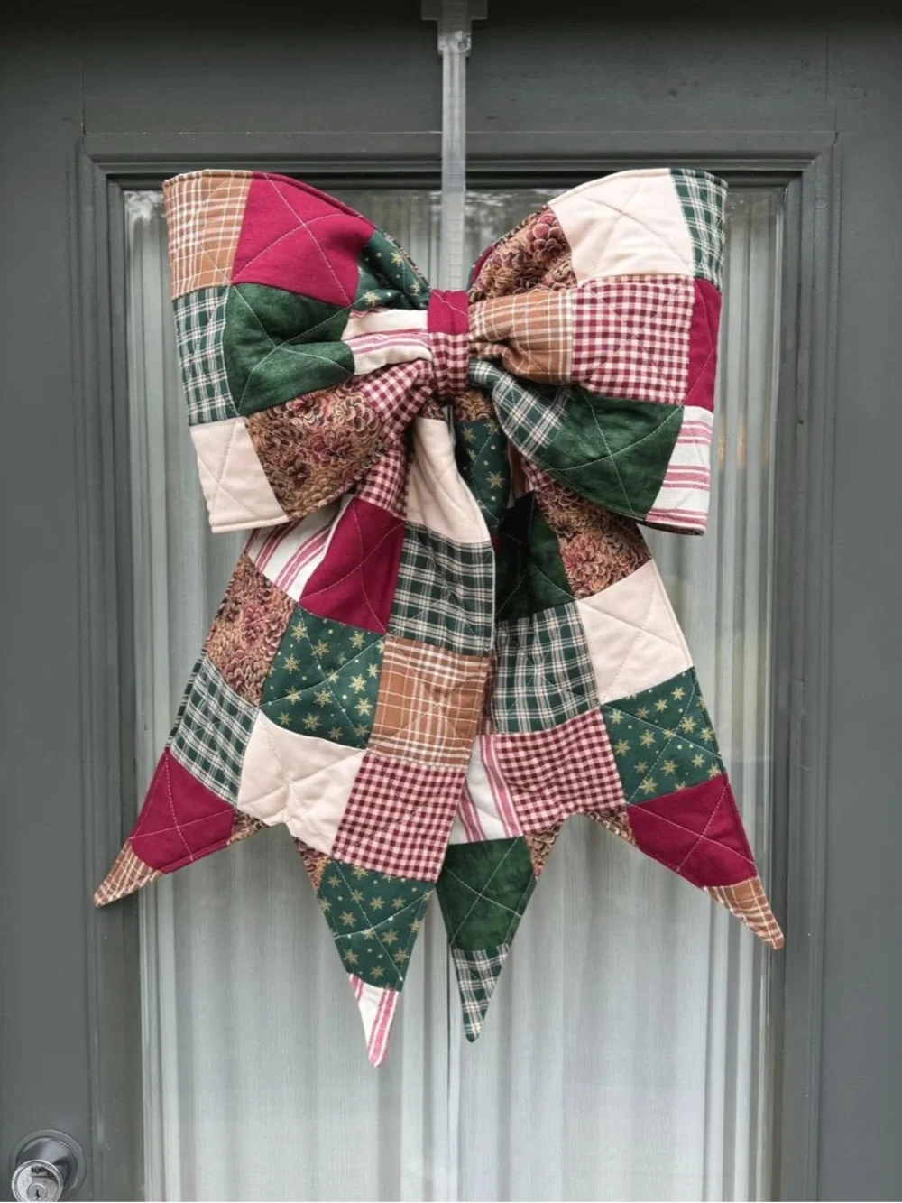 Patchwork Holiday Bow Door Hanger - Red Green Cream